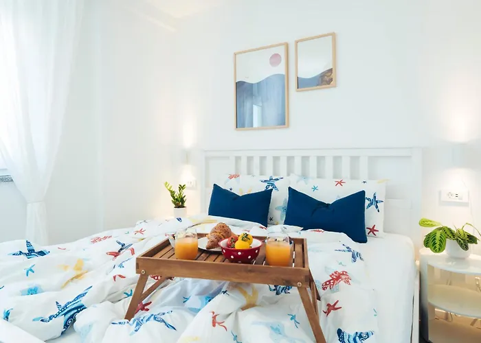 Apartment Raza - Beachfront On Rab - Sea View & Private Boat Dock *